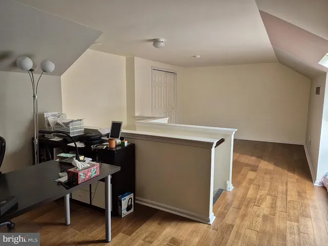 a workspace with wooden floor