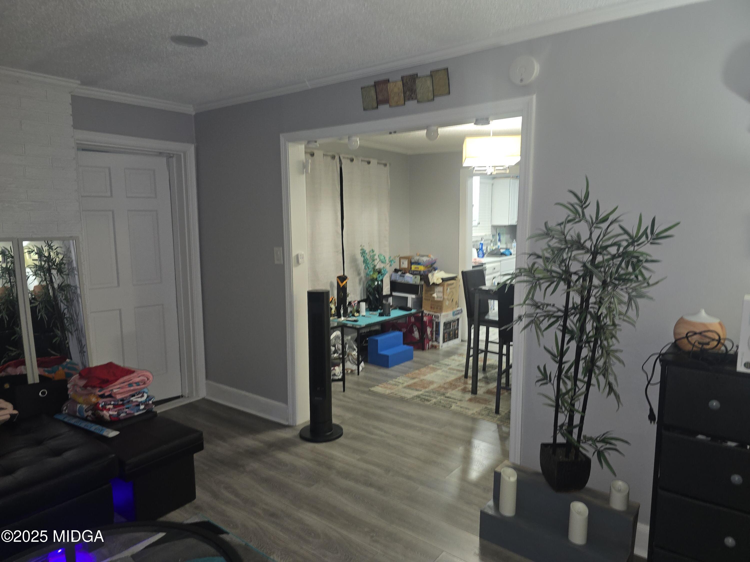 2420 Adams Avenue Macon, GA 31206 - Photo 2 of 5 a view of a room with gym equipment