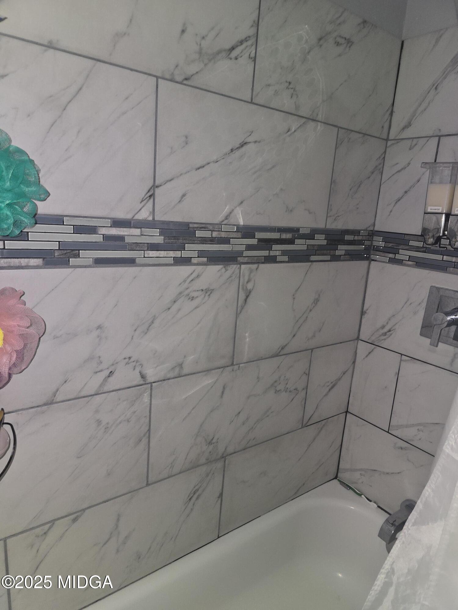 2420 Adams Avenue Macon, GA 31206 - Photo 5 of 5 a bathroom with a shower