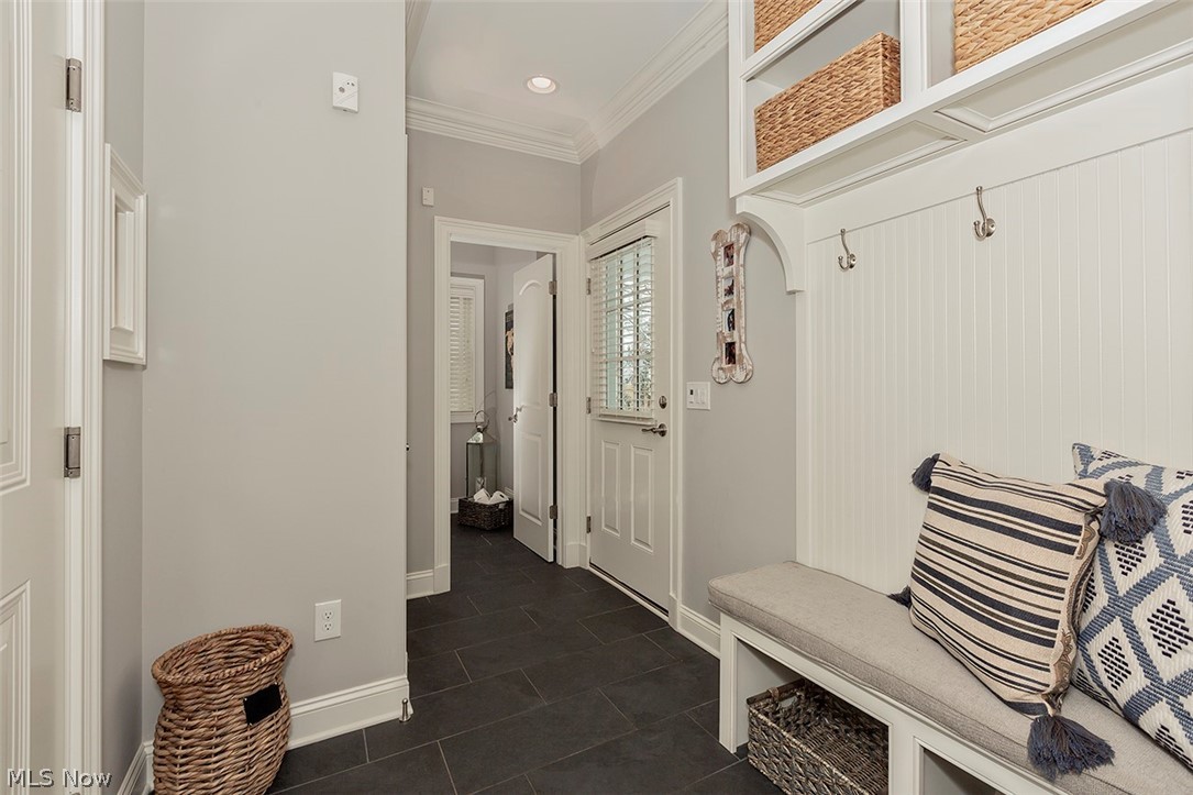 22688 Douglas Road Shaker Heights, OH 44122 - Photo 13 of 28 The back hall mudroom leads to a powder room and the two car attached garage.