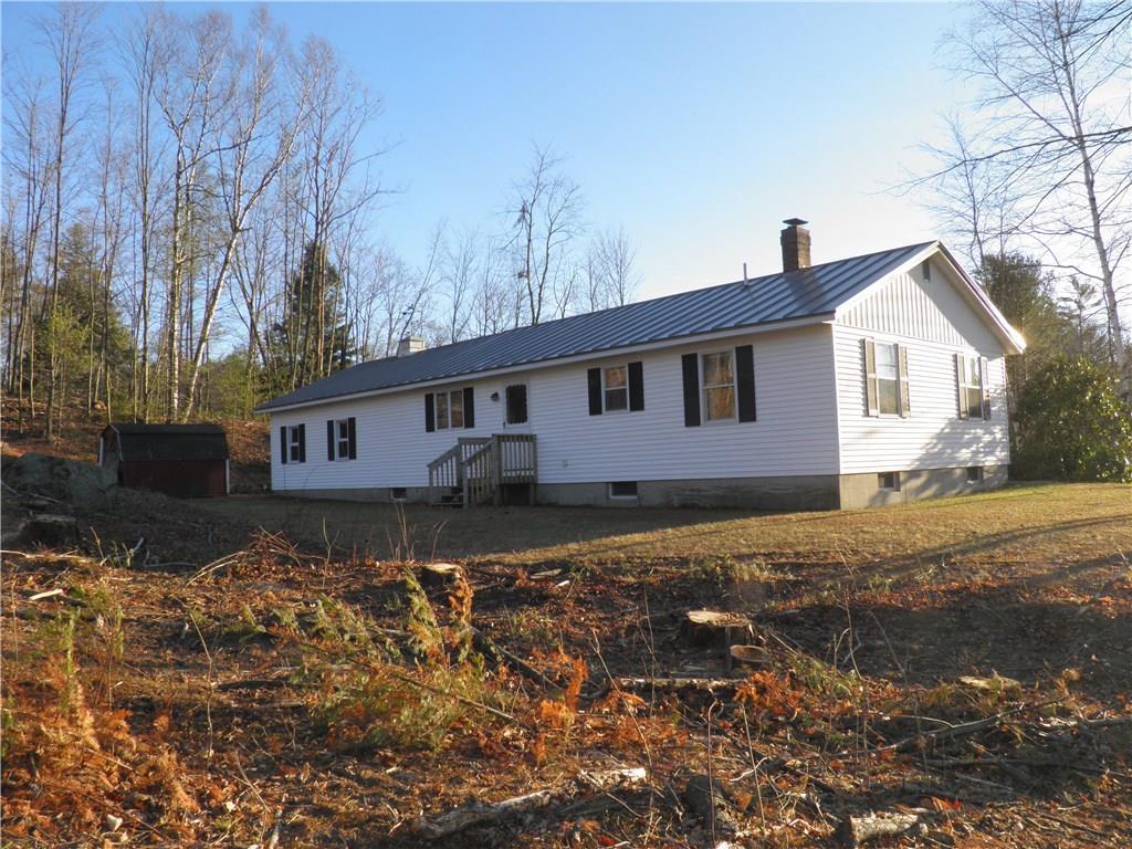 193 Main Street Jay, ME 04239 - Photo 2 of 15 Back of house with plenty of privacy!