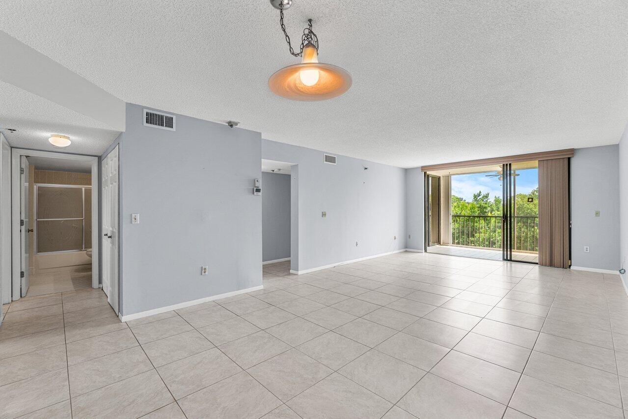 6530 Boca Del Mar Drive, Unit 336 Boca Raton, FL 33433 - Photo 11 of 22 a view of an empty room with a window