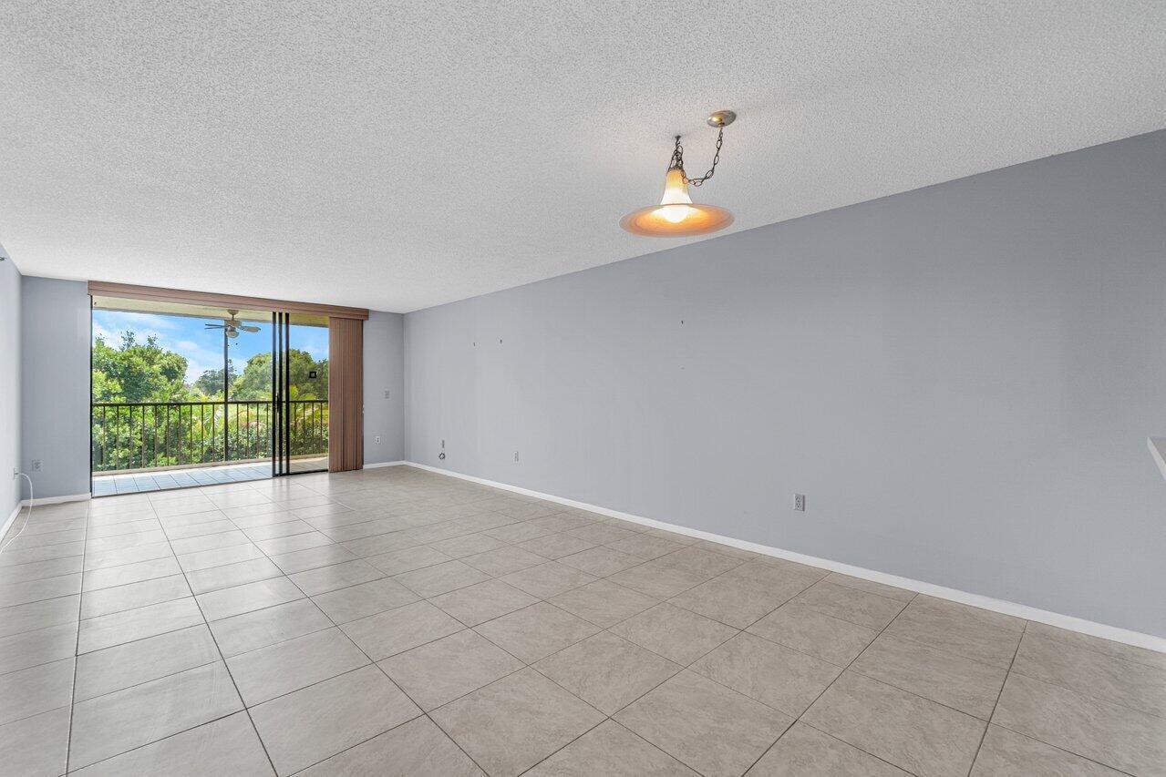 6530 Boca Del Mar Drive, Unit 336 Boca Raton, FL 33433 - Photo 10 of 22 an empty room with a window