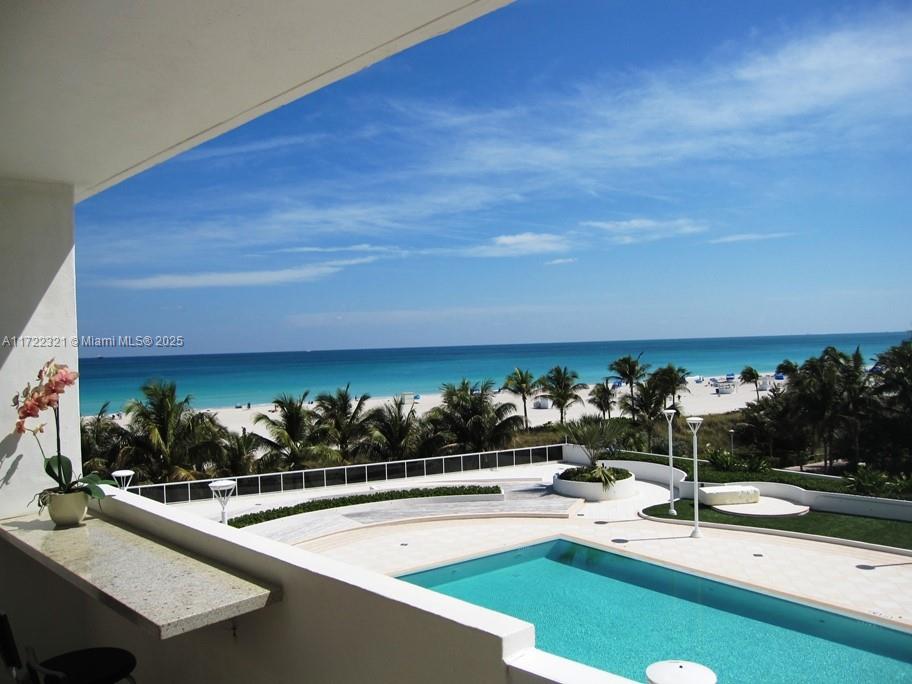 100 Lincoln Road, Unit 444 Miami Beach, FL 33139 - Photo 12 of 18 a view of a swimming pool and outdoor seating