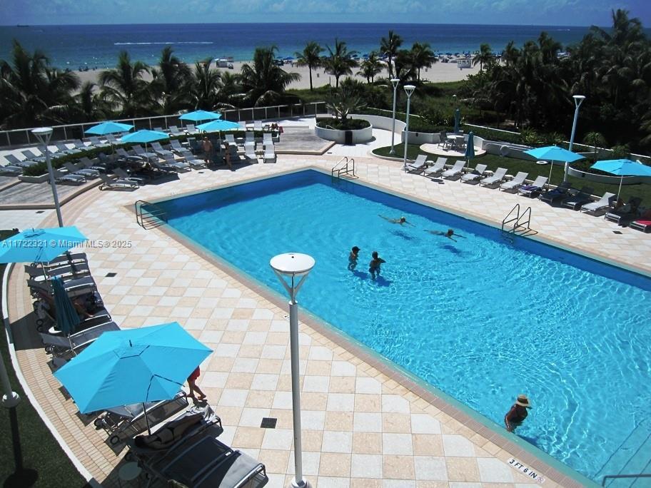 100 Lincoln Road, Unit 444 Miami Beach, FL 33139 - Photo 13 of 18 a view of swimming pool from a balcony