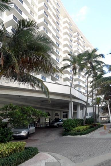 100 Lincoln Road, Unit 444 Miami Beach, FL 33139 - Photo 16 of 18 a front view of a house with plants and trees