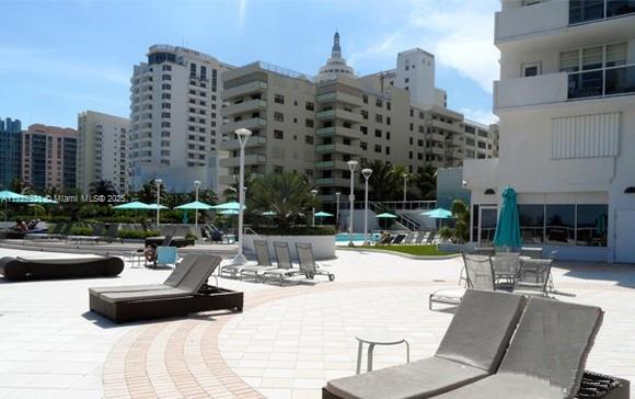 100 Lincoln Road, Unit 444 Miami Beach, FL 33139 - Photo 17 of 18 a view of a tall building and view of the terrace