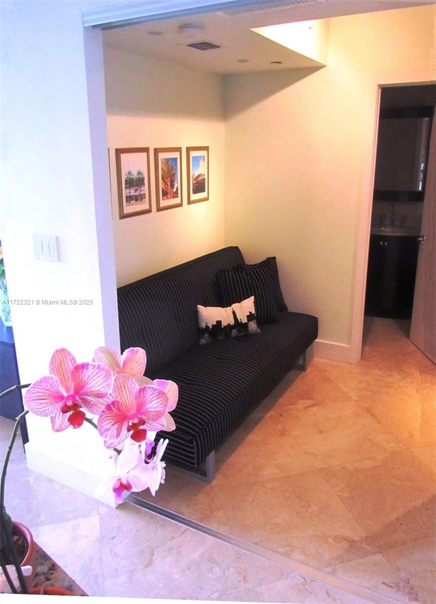 100 Lincoln Road, Unit 444 Miami Beach, FL 33139 - Photo 10 of 18 a bed room with a bed