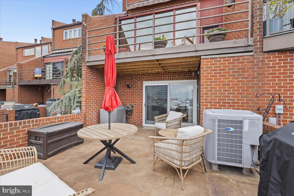 2409 Boston Street Baltimore, MD 21224 - Photo 12 of 46 a building outdoor space with patio furniture