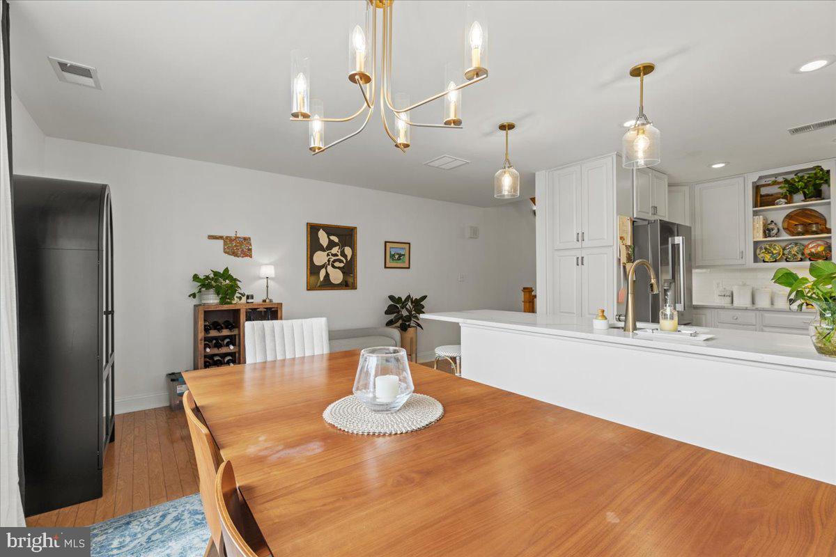 2409 Boston Street Baltimore, MD 21224 - Photo 24 of 46 a view of a dining room with furniture