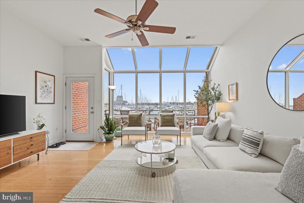 2409 Boston Street Baltimore, MD 21224 - Photo 28 of 46 a living room with furniture and a large window