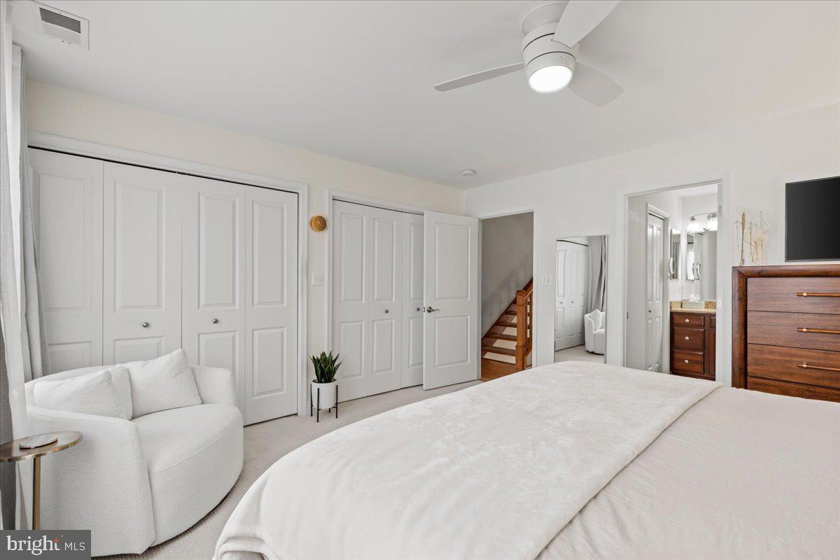 2409 Boston Street Baltimore, MD 21224 - Photo 33 of 46 a bedroom with a bed and a flat screen tv