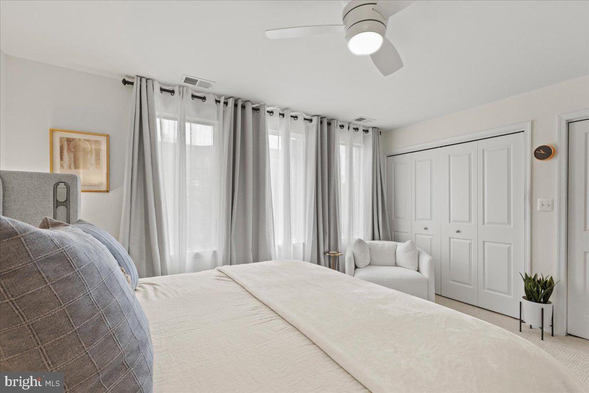 2409 Boston Street Baltimore, MD 21224 - Photo 34 of 46 a bedroom with a bed and a window