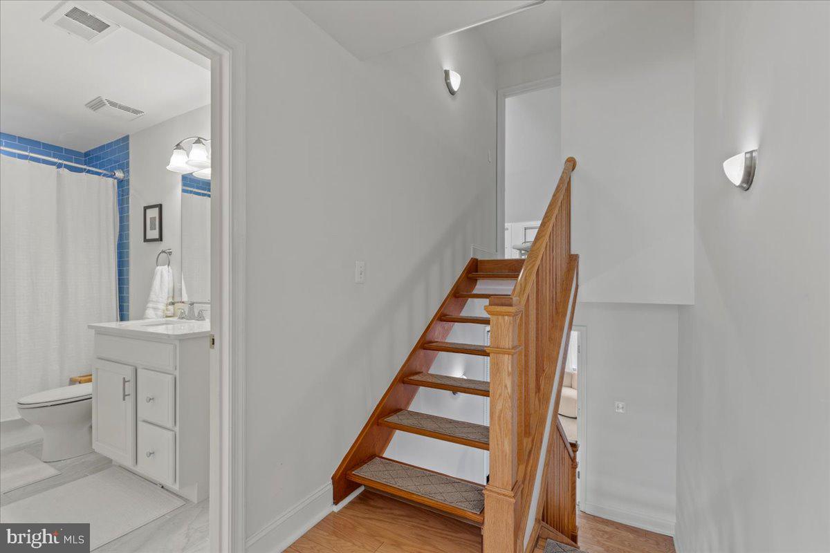 2409 Boston Street Baltimore, MD 21224 - Photo 37 of 46 a view of a hallway with seating area