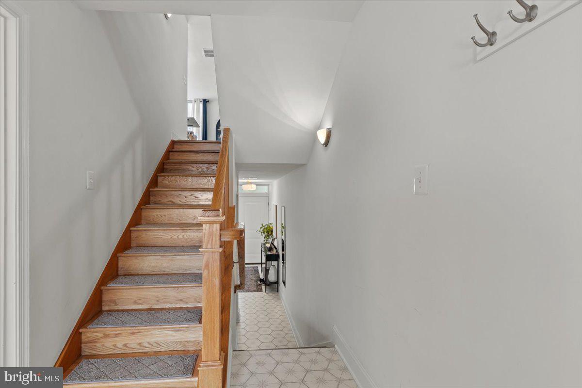 2409 Boston Street Baltimore, MD 21224 - Photo 5 of 46 a view of entryway and hall with wooden floor