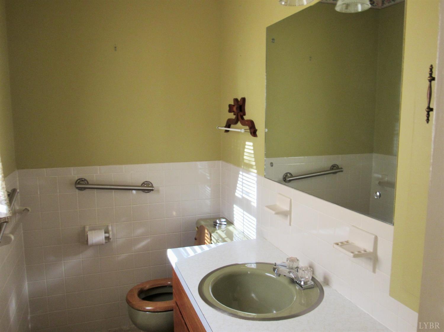 739 Kenmore Road Amherst, VA 24521 - Photo 13 of 27 a bathroom with a sink and a toilet
