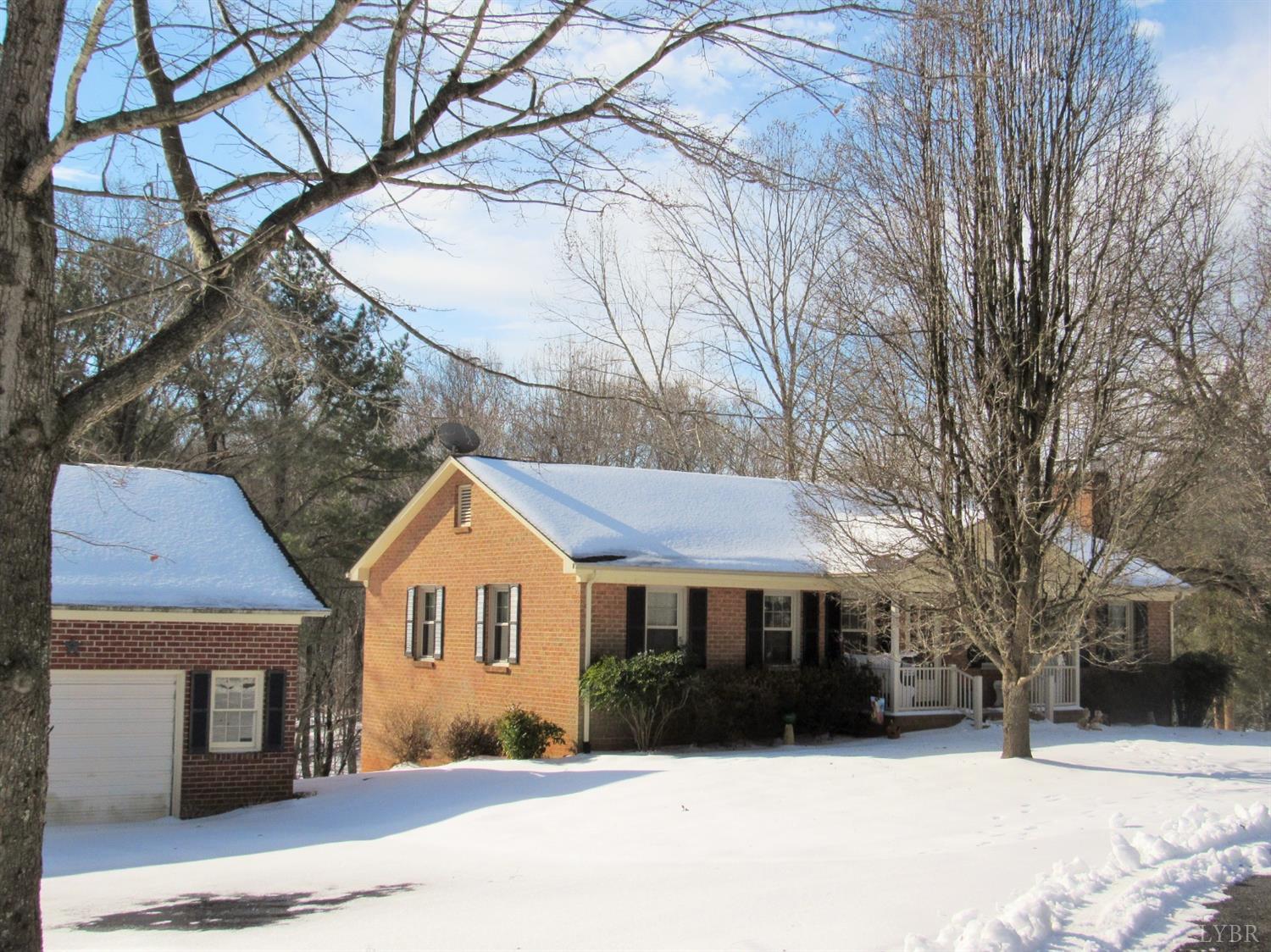 739 Kenmore Road Amherst, VA 24521 - Photo 3 of 27 a front view of a house with a yard covered in snow