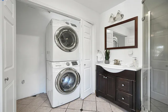 a kitchen with stainless steel appliances a refrigerator and a sink