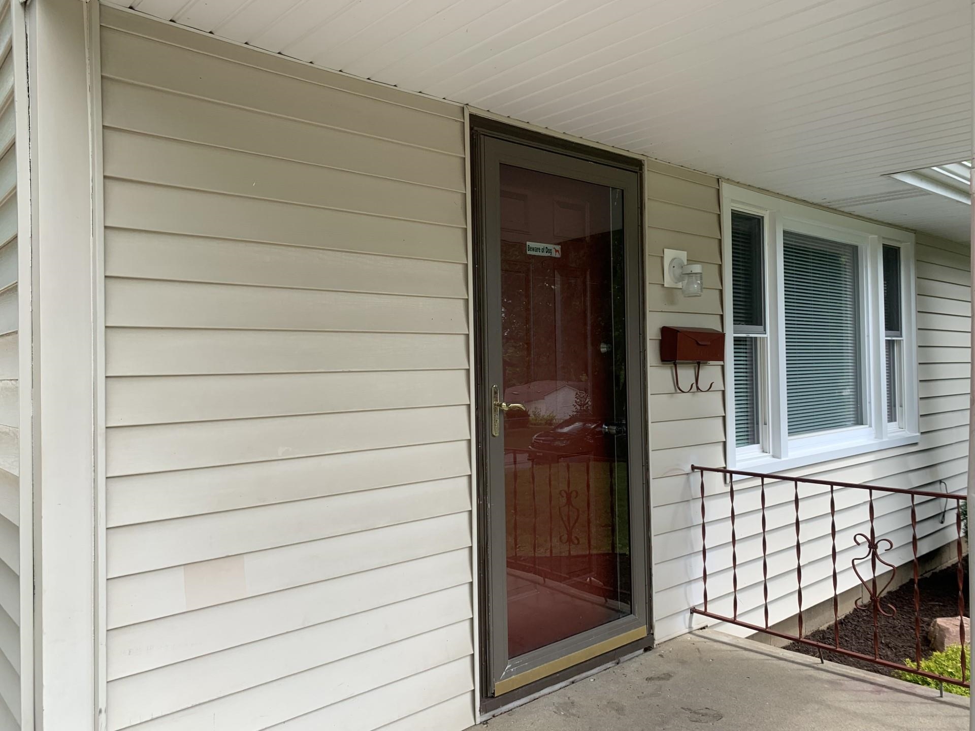 2020 Ridgeland Road Rockford, IL 61108 - Photo 4 of 19 a view of front door of house