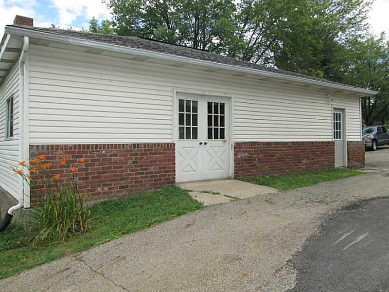 518 Iron Bridge Road Kittanning, PA 16201 - Photo 5 of 25 Parking Lot/Garage. 40x20 garage showing the dual side doors and paved driveway.