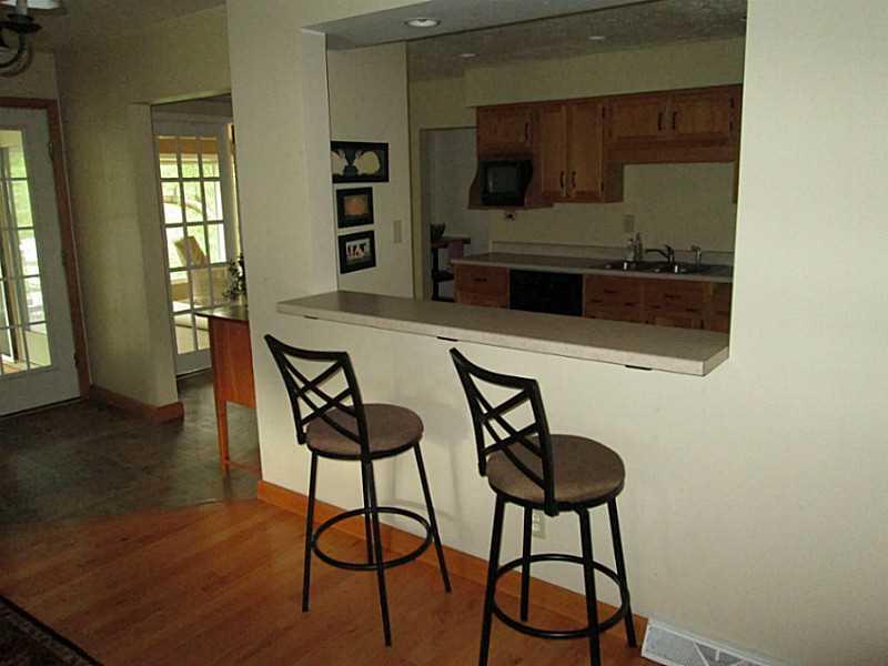 518 Iron Bridge Road Kittanning, PA 16201 - Photo 9 of 25 Dining Room. Breakfast bar from dining room into kitchen.