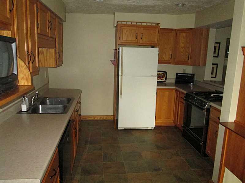 518 Iron Bridge Road Kittanning, PA 16201 - Photo 10 of 25 Kitchen. Nice large 17x9 kitchen with oak cabinets and breakfast bar to the right.