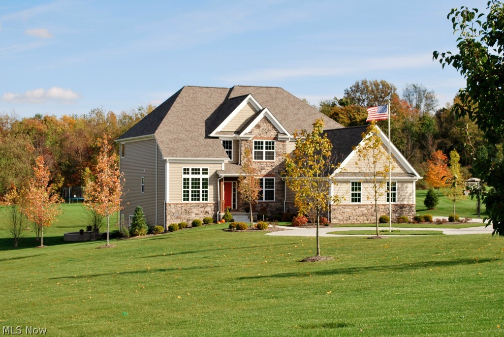 5785 Spring Ridge Drive Medina, OH 44256 - Photo 1 of 25 Welcome to 5785 Spring Ridge, located in The Ridge, Sharon Twp, note circle drive area for the ease of guests.