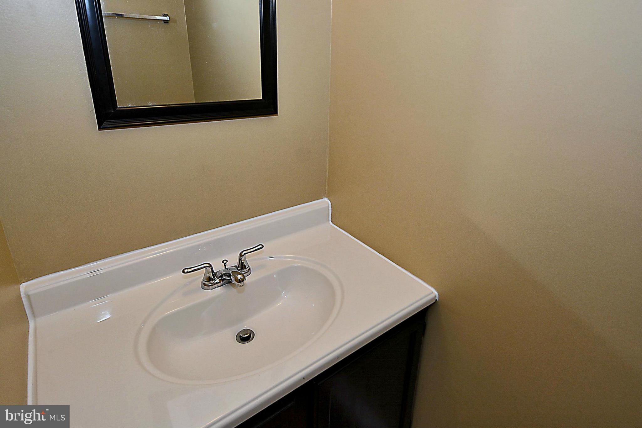 10848 Douglas Avenue Silver Spring, MD 20902 - Photo 12 of 30 Main level powder room