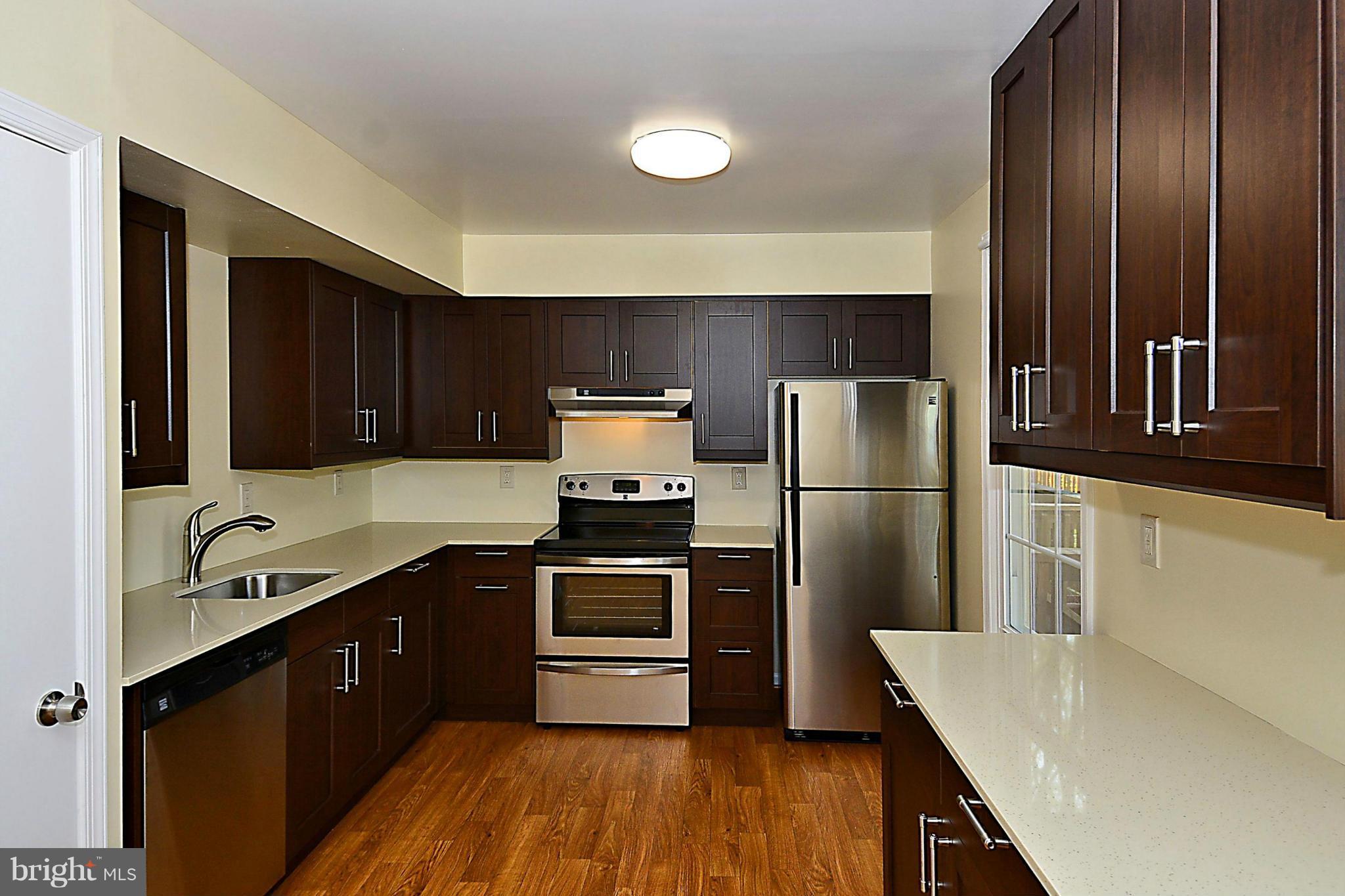 10848 Douglas Avenue Silver Spring, MD 20902 - Photo 8 of 30 NEW Kitchen! Stainless appliances, quartz counters