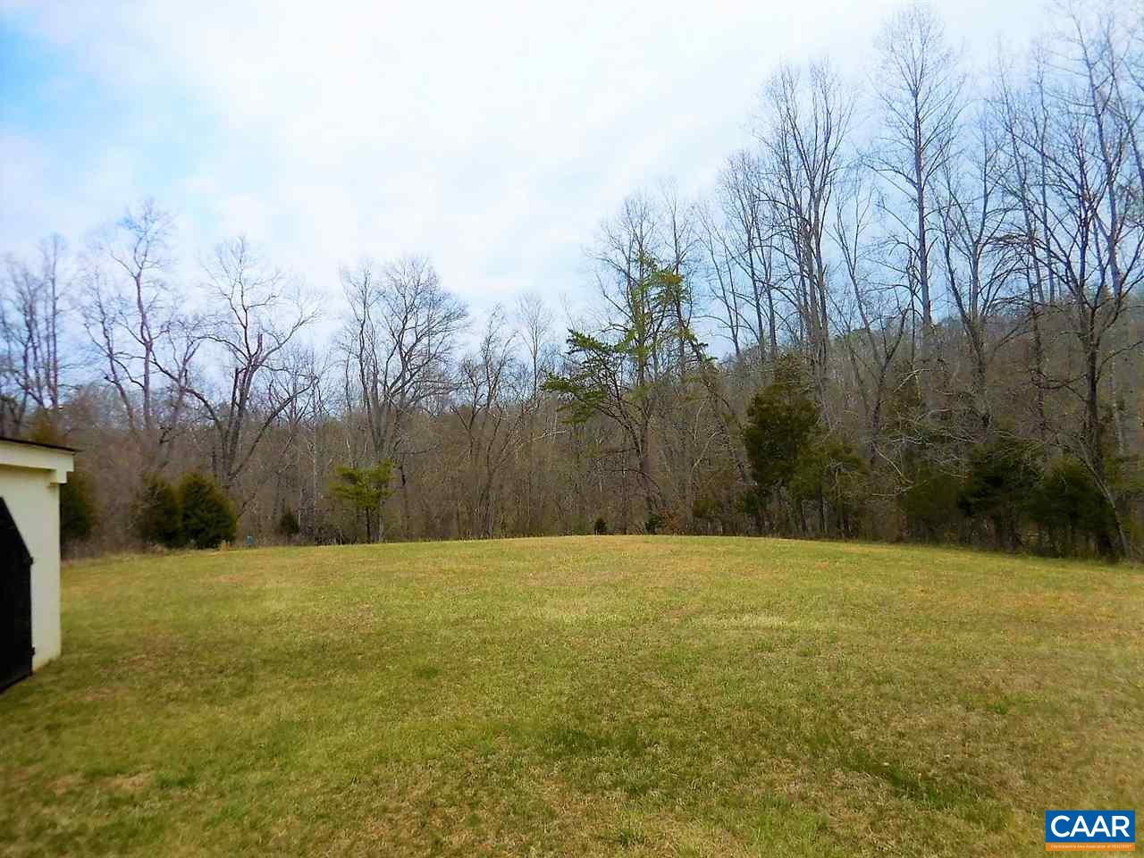 587 Richmond Road Keswick, VA 22947 - Photo 8 of 25 Property slopes toward Mechunk Creek on this side.