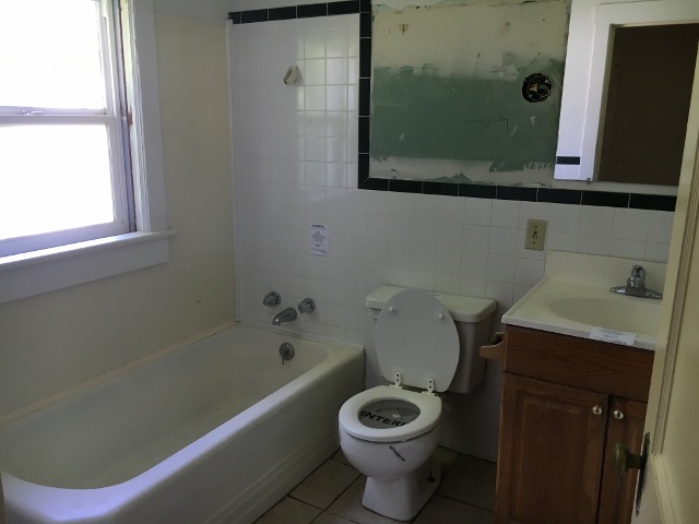1882 Shutterlee Mill Road Staunton, VA 24401 - Photo 12 of 20 a bathroom with a toilet and a bathtub