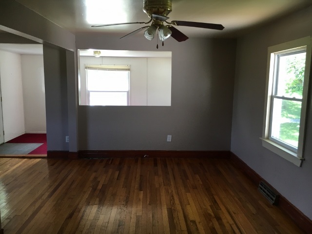1882 Shutterlee Mill Road Staunton, VA 24401 - Photo 2 of 20 a view of an empty room with wooden floor and a window