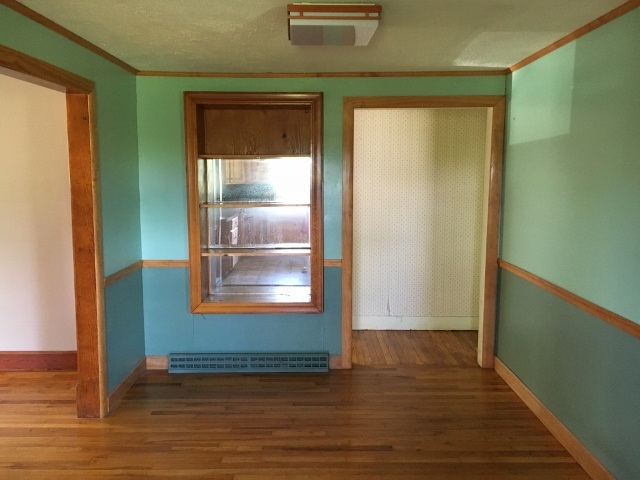1882 Shutterlee Mill Road Staunton, VA 24401 - Photo 5 of 20 an empty room with wooden floor and windows