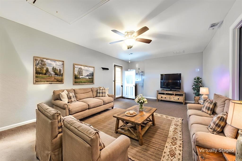 246 Meadow Ridge Circle Royse City, TX 75189 - Photo 20 of 24 This room has been virtually staged. Currently used as a bedroom~ living combo