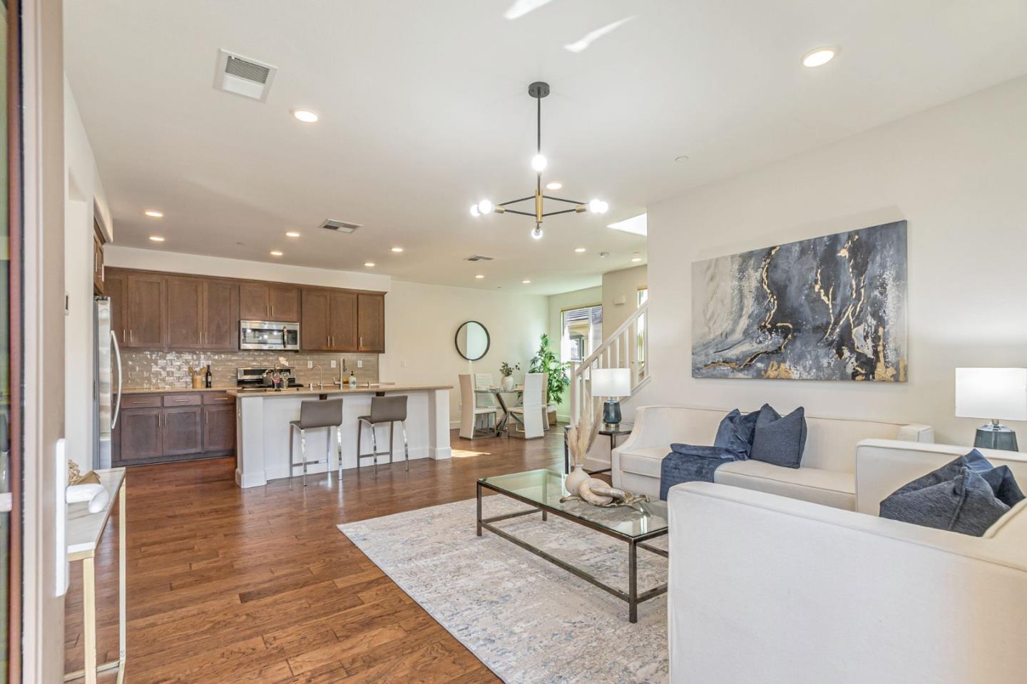 38984 Primula Terrace Newark, CA 94560 - Photo 4 of 32 a living room with furniture and kitchen view