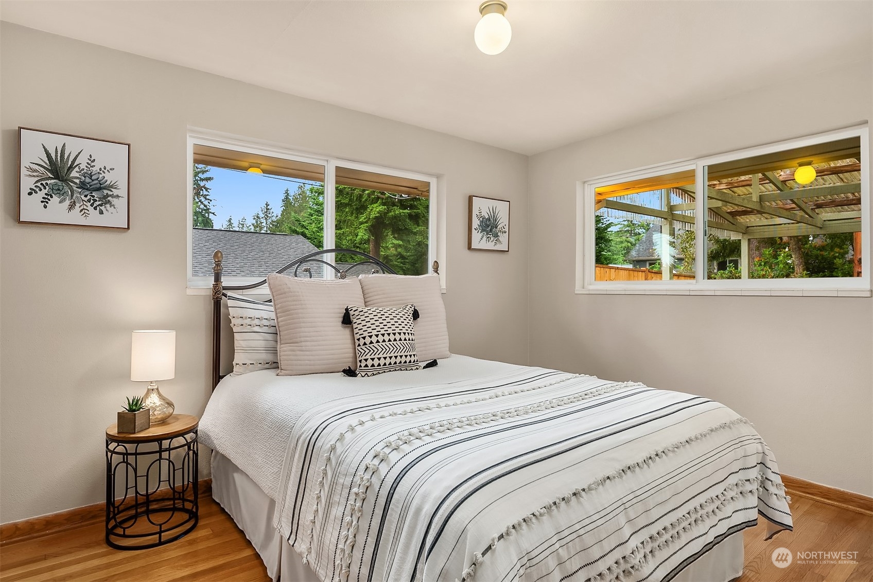17512 Fremont Avenue North Shoreline, WA 98133 - Photo 16 of 35 a bedroom with a bed and a window
