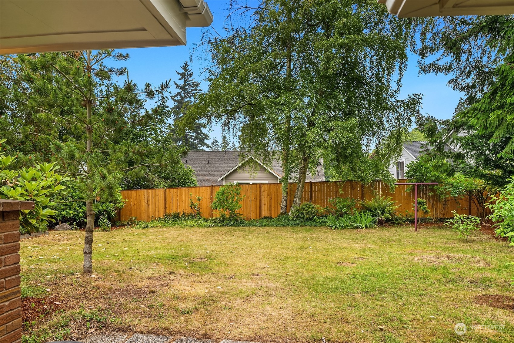 17512 Fremont Avenue North Shoreline, WA 98133 - Photo 26 of 35 a view of yard and swimming pool