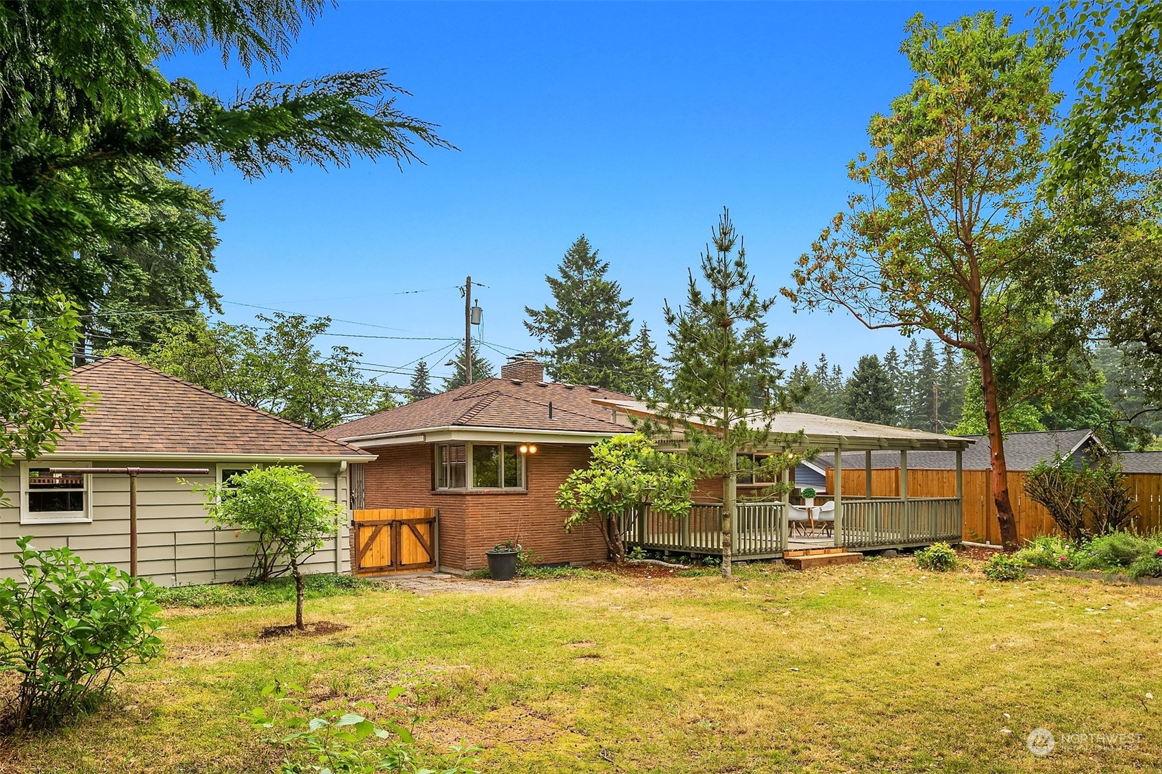 17512 Fremont Avenue North Shoreline, WA 98133 - Photo 28 of 35 a swimming pool with outdoor seating and yard