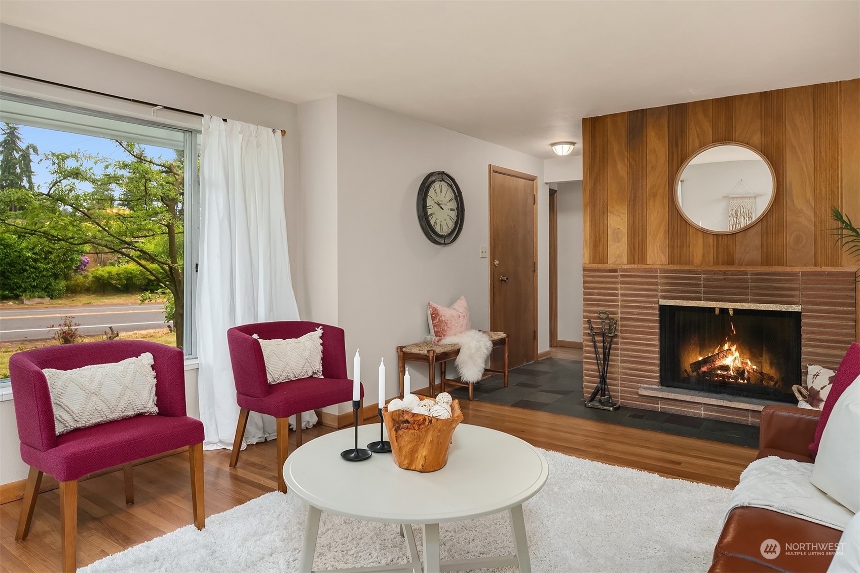 17512 Fremont Avenue North Shoreline, WA 98133 - Photo 3 of 35 a living room with furniture and a fireplace