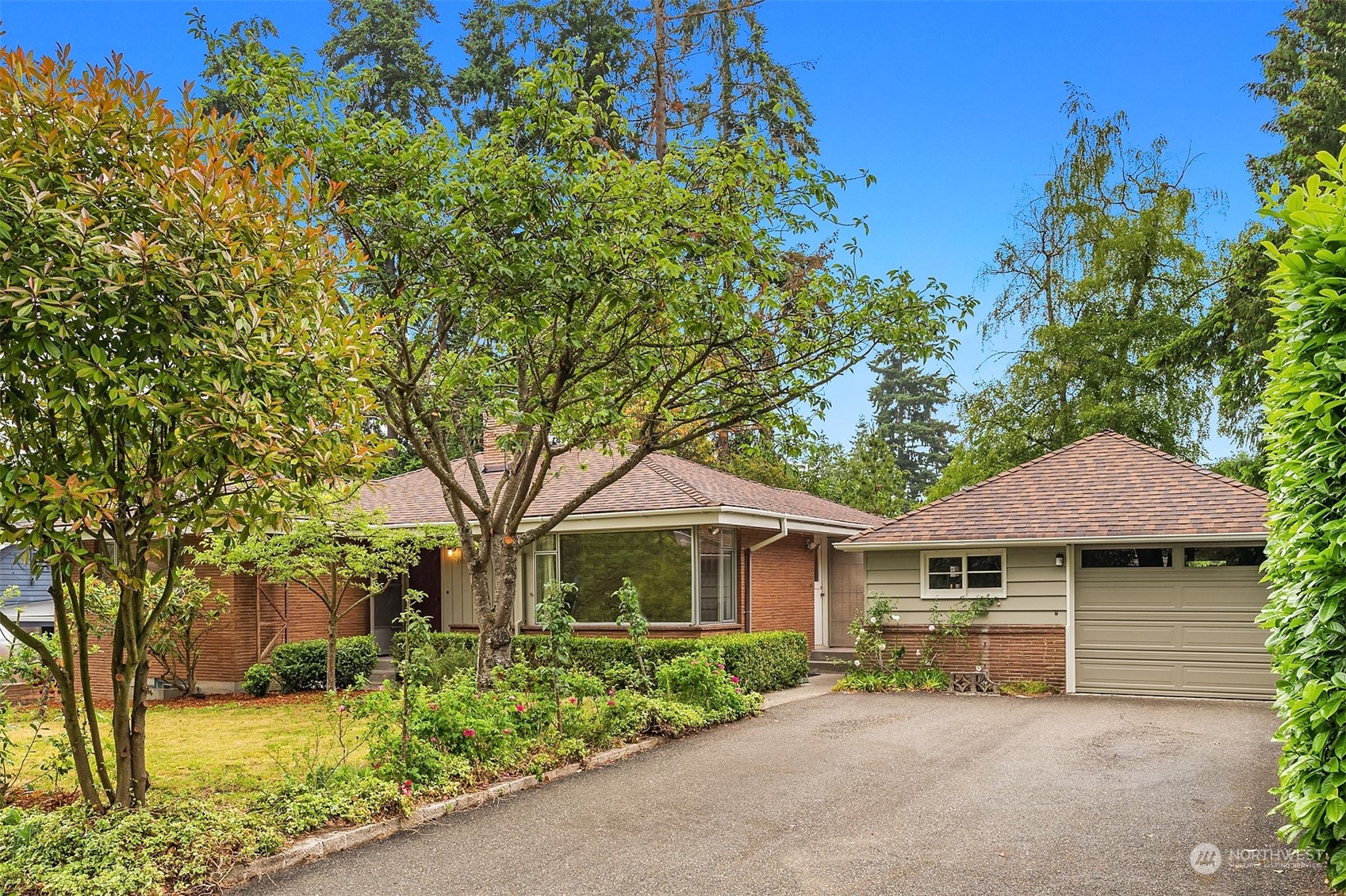 17512 Fremont Avenue North Shoreline, WA 98133 - Photo 35 of 35 a front view of a house with a garden