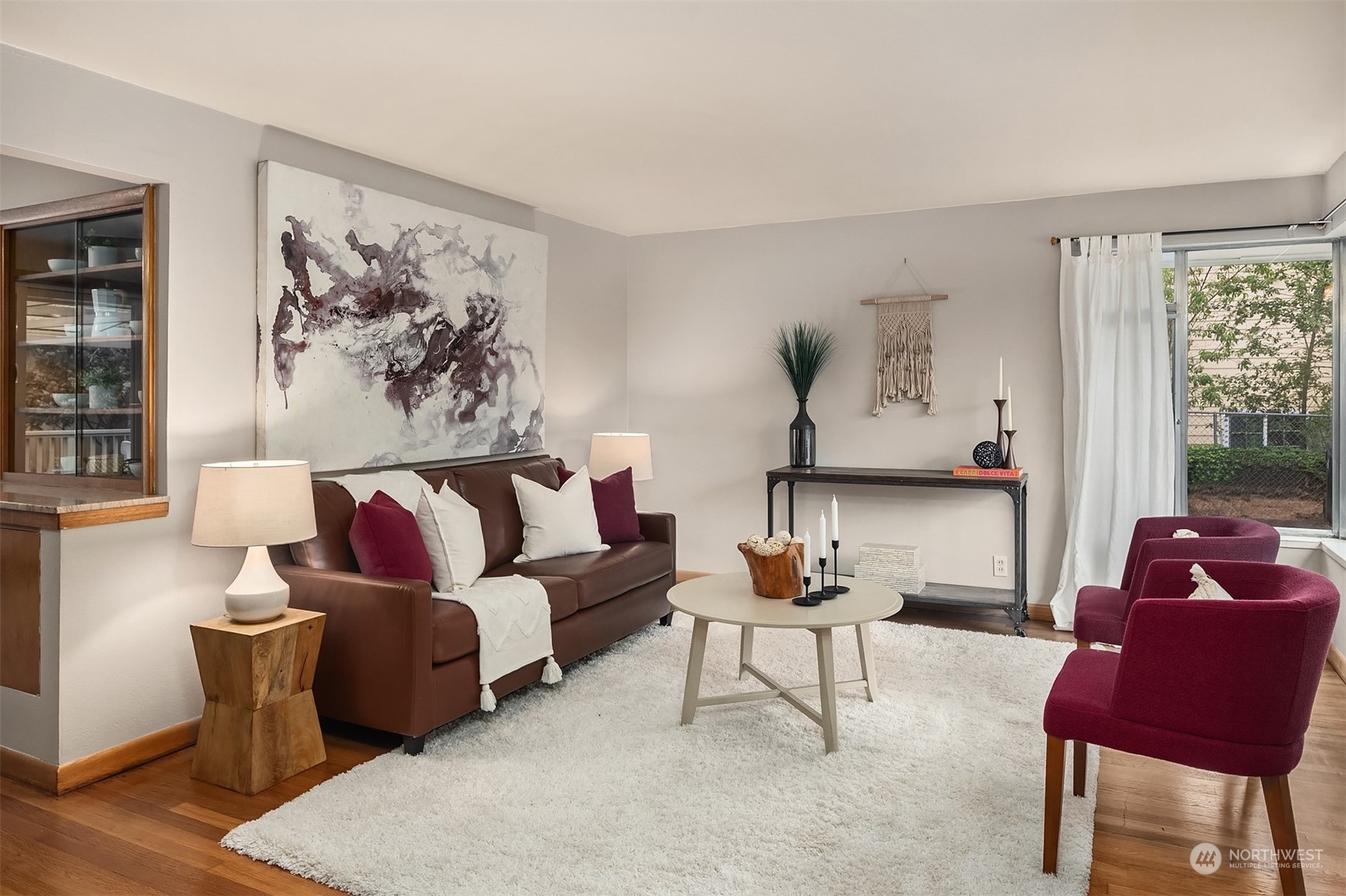 17512 Fremont Avenue North Shoreline, WA 98133 - Photo 5 of 35 a living room with furniture and a large window