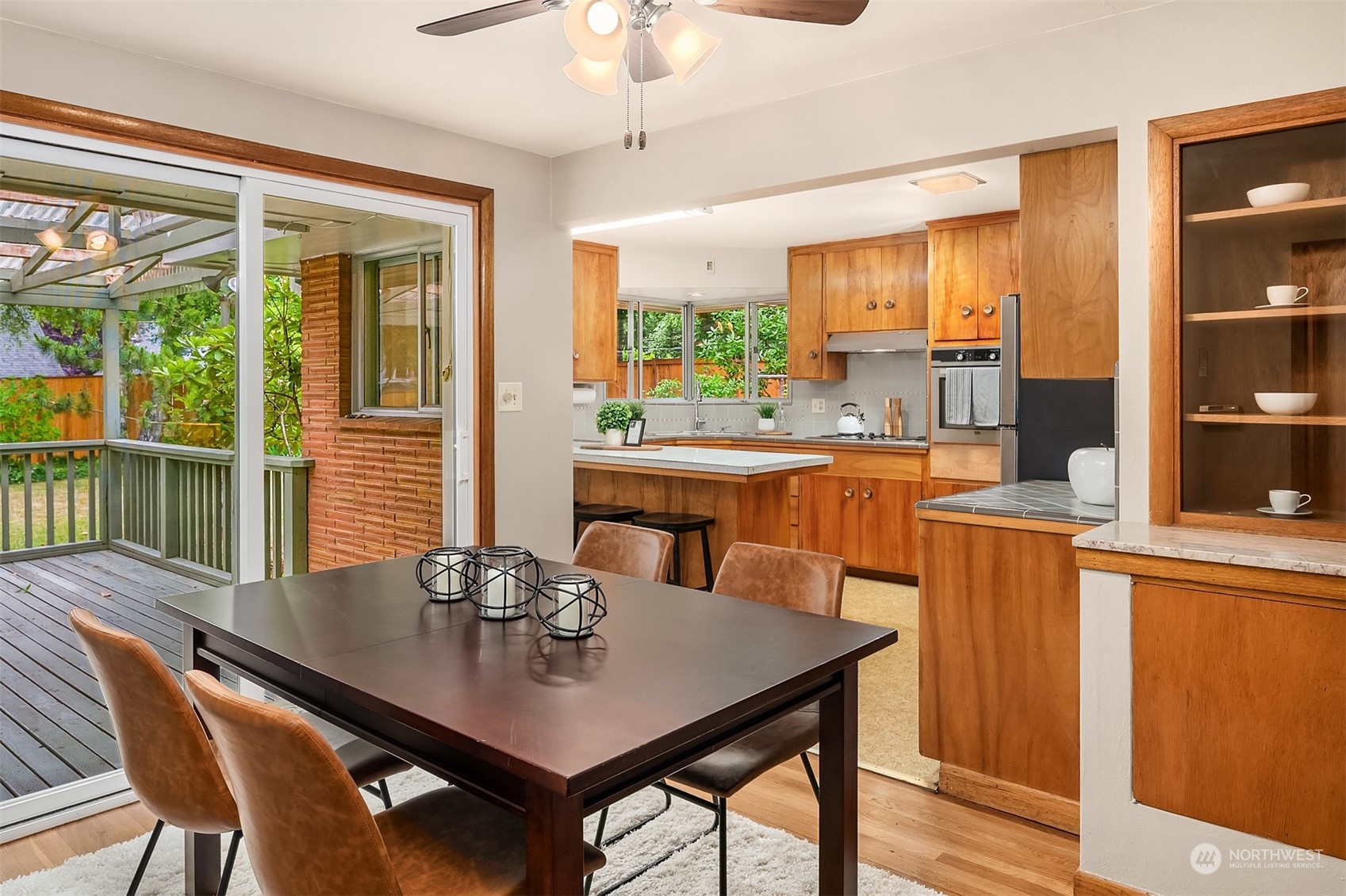 17512 Fremont Avenue North Shoreline, WA 98133 - Photo 7 of 35 a view of a dining room with furniture window and outside view