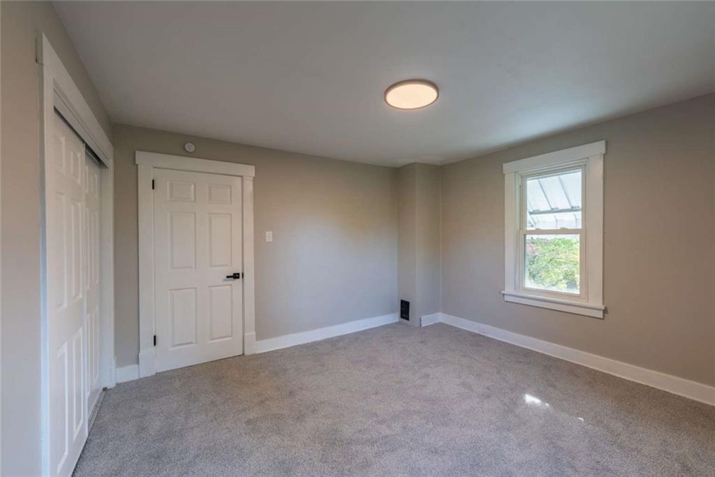619 Barclay Avenue Pittsburgh, PA 15221 - Photo 16 of 23 a view of an empty room with a window