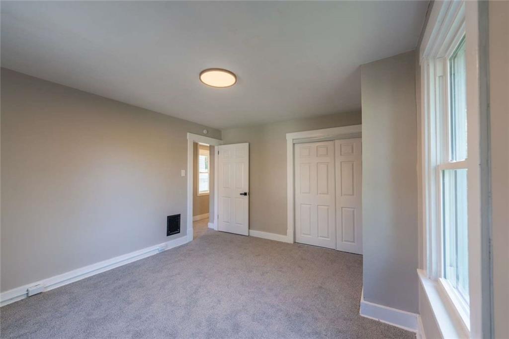 619 Barclay Avenue Pittsburgh, PA 15221 - Photo 18 of 23 an empty room with windows and closet