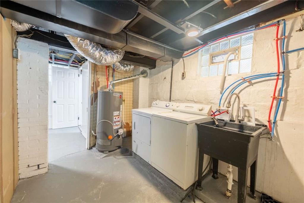 619 Barclay Avenue Pittsburgh, PA 15221 - Photo 21 of 23 a utility room with dryer and washer