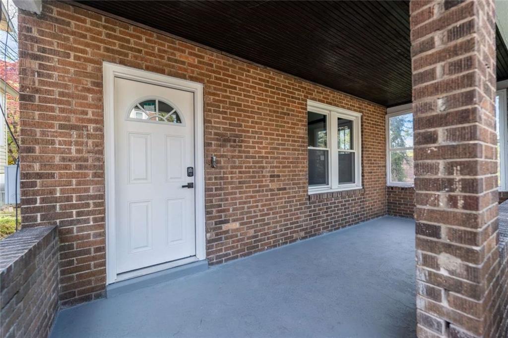 619 Barclay Avenue Pittsburgh, PA 15221 - Photo 3 of 23 a view of an empty room with a window