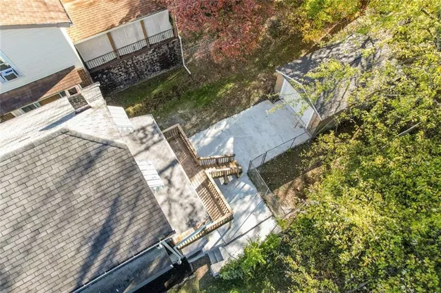 a view of a backyard with sitting area