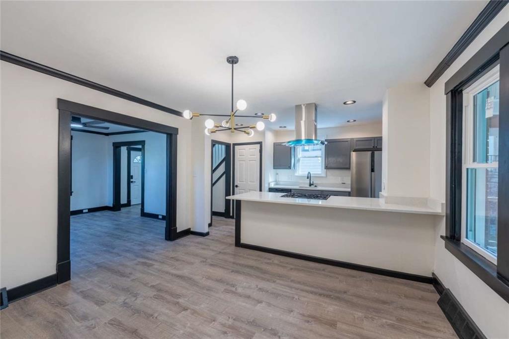 619 Barclay Avenue Pittsburgh, PA 15221 - Photo 10 of 23 a view of a kitchen with windows