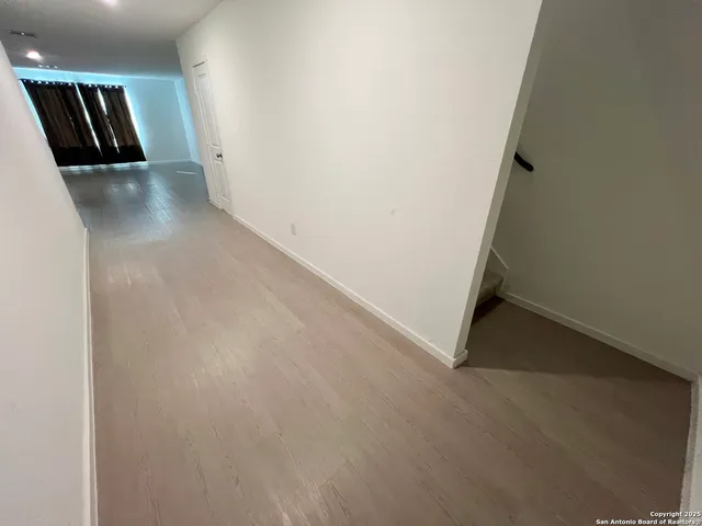 a bathroom with a sink toilet and a mirror