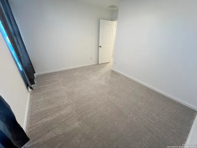 a view of balcony with wooden floor and lake view